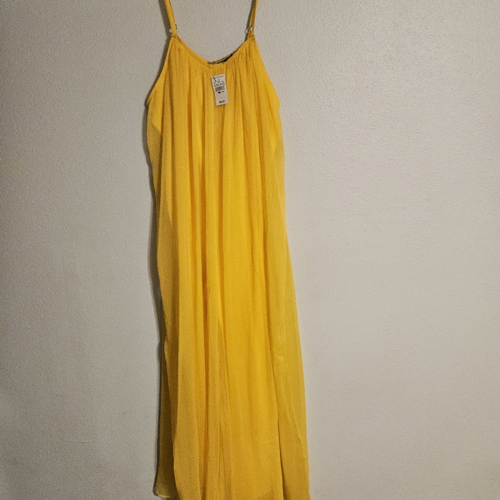 Plus size causal romper with slight smudge on strap